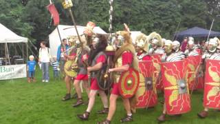 Roman Reenactment at the Amphitheatre in Caerleon Marching In [upl. by Suoivatnod]